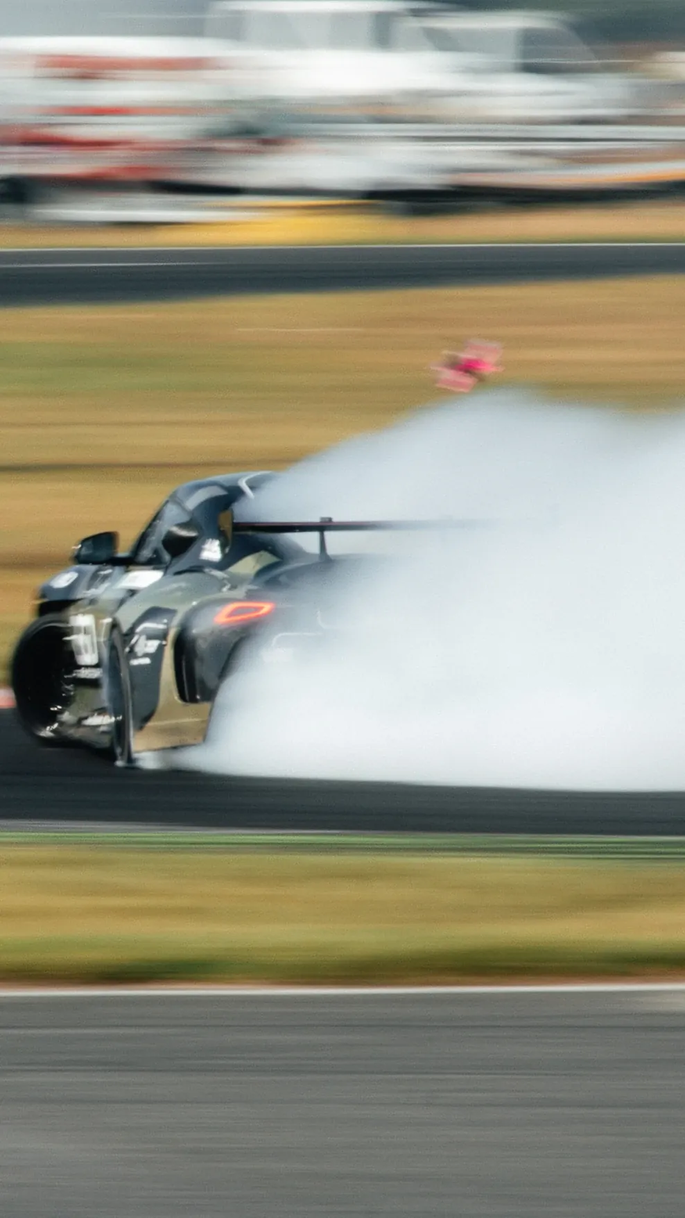 Drift car cutting through tyre smoke