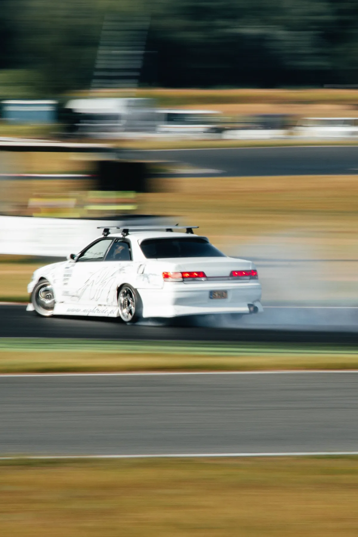 White track car in motion