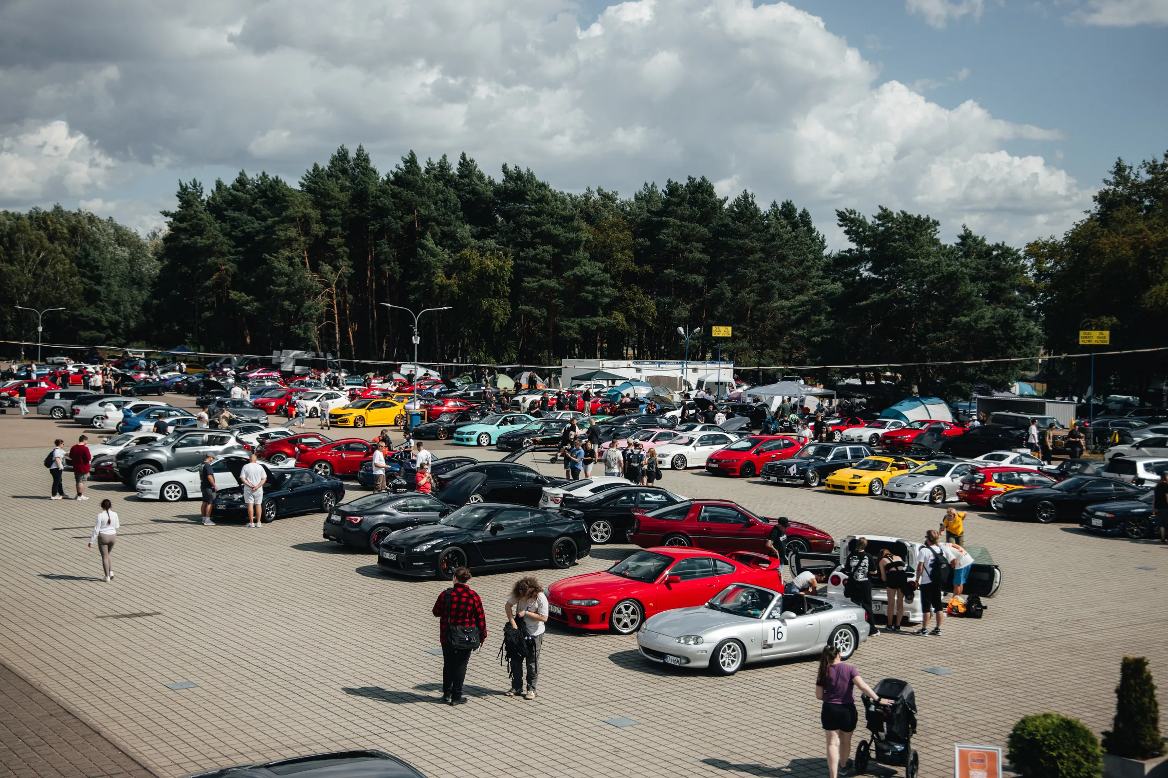 Aerial view of motorsport event cars and spectators